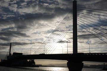 A shadow of the bridge at sunrise