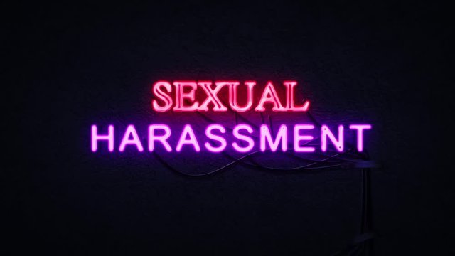 Sexual Harassment Sign in Sleazy Neon Light