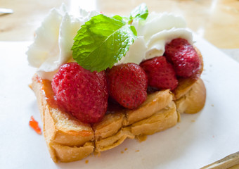 Toast bread with strawberry and whipping cream