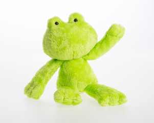 Fototapeta premium toy or frog soft toy on the background.