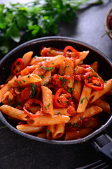 Penne pasta with chili sauce arrabiata