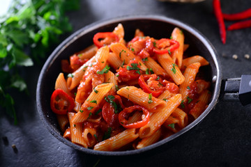 Penne pasta with chili sauce arrabiata