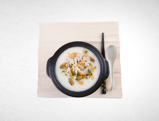 Porridge or dried oysters porridge on a background.