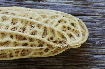 Boiled Bean cover with dark dust on wooden floor