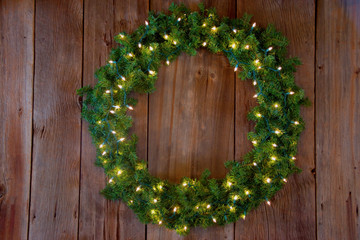 Christmas Green Wreath on Cedar Background