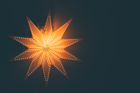 Lit up glowing christmas star background