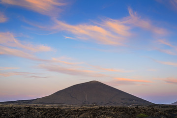 Obraz na płótnie Canvas Stunning view of the volcanic landscape at sunset. Lanzarote. Canary Islands. Spain