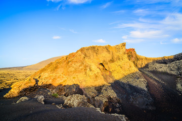 Incredible volcanic landscape in the volcano crater of El Cuervo. Lanzarote. Canary Islands. Spain