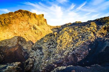 Incredible volcanic landscape in the volcano crater of El Cuervo. Lanzarote. Canary Islands. Spain