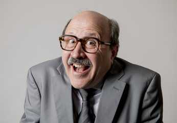 portrait of happy and cheerful senior mature 60s business man smiling wearing dressing formal necktie looking cheerful and excited