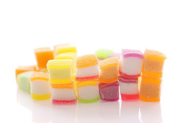 Colorful cube jelly candy isolated in white background