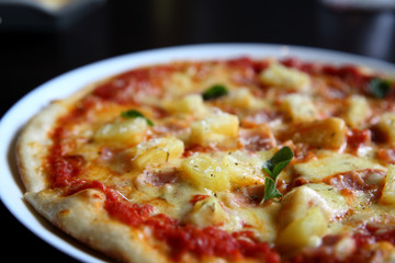 Hawaiian pizza , Pizza with ham pineapple cheese on wood background