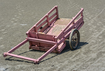 Wooden Pink cart of  fisherman On the beach, Chaolao Beach, Chanthaburi, Thailand. 