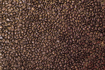 Coffee beans pattern background gold and dark