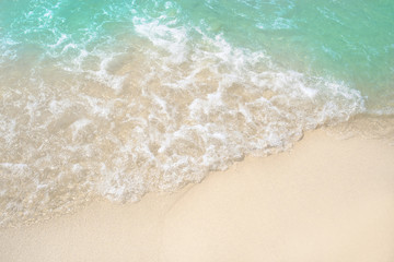 wave and sand on beautiful ocean beach