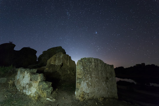 Night Photography with ruins in the Natural Area of Barruecos. Extremadura. Spain.