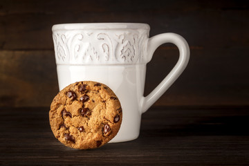 Chocolate chips cookie, hot chocolate, and place for text