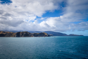 Lighthouse on cliffs near Wellington, New Zealand © daboost