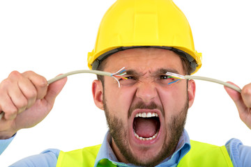 Portrait of crazy electrician over white background