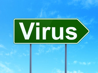 Safety concept: Virus on green road highway sign, clear blue sky background, 3D rendering