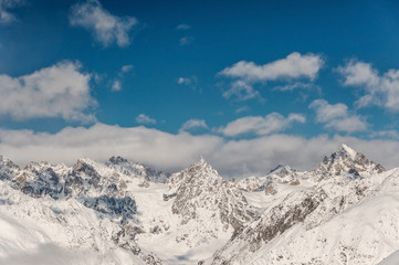 Scenic view of winter mountains under the sky