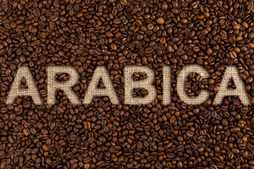 Obraz na płótnie Canvas Arabic concept written on coffee beans