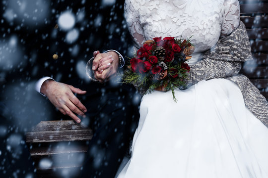 Happy bride and groom enjoying romantic moments outdoors. Wedding couple.Winter concept.