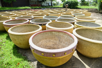 Fototapeta premium Big water jars in Thailand.Vintage big water jar in the garden