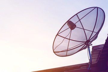 Satellite antenna against with blue sky background
