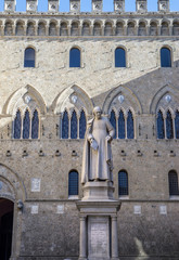 front view of Sallustio Bandini Statue in Piazza Salimbeni