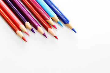 Colored pencil as wallpaper / A colored pencil is an art medium constructed of a narrow, pigmented core encased in a wooden cylindrical case.