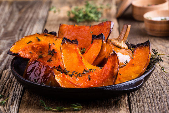 Baked pumpkin with thyme in cast iron skillet