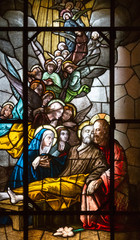 Casorate Primo, Italy. October 26 2017. Stained glass depicting the death of Saint Joseph. Jesus...