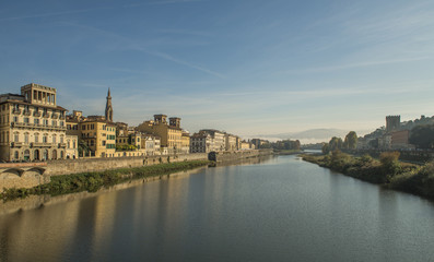 Riverside in Florence with water reflections