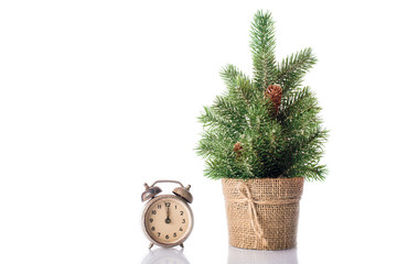 Christmas tree with clock isolated on white