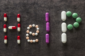 The word Help made out of colorful pills. Medicine and healthy. Different kind of pills.