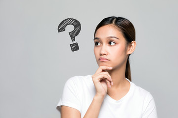 young woman with question marks.