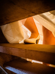 The bride climbs the stairs