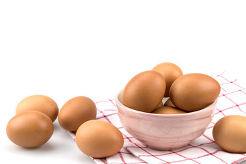 Eggs in mini yellow bowl , isolated on white background