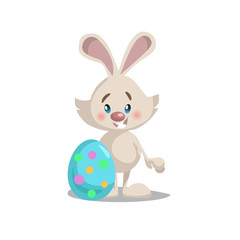 Cartoon cute easter bunny with painted egg. Easter spring vector mascot illustration.