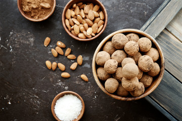 Raw candies from dates, cocoa, coconut and nuts. Vegetarian food. The concept of a healthy diet
