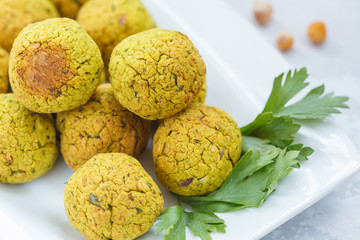 Fresh baked falafel with parsley. Vegan dietary healthy food concept.