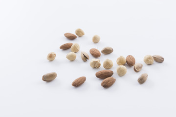 Gray background isolated mixed nuts
