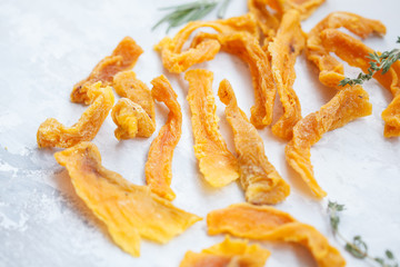Dried pumpkin - healthy chips with herbs.