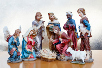 Naklejka premium Nativity Scene on a wooden surface