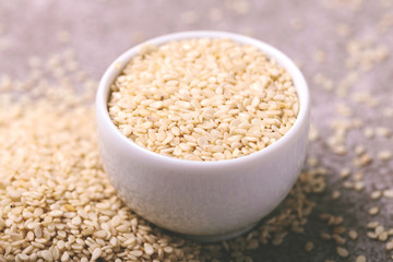 White sesame seeds. Copy space. Horizontal view.