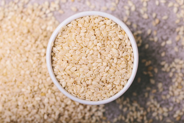 White sesame seeds. Copy space. Top view.