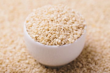 White sesame seeds. Copy space. Horizontal view.
