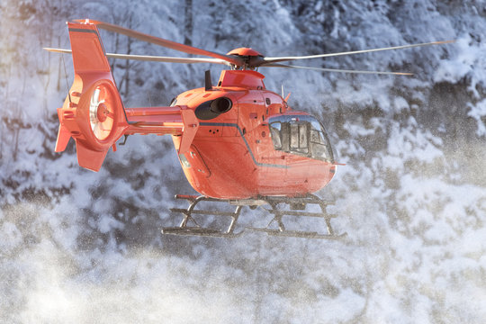 Germany, Berchtesgadener Land, flying helicopter in winter