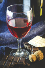 red wine in a glass on a large-scale table
